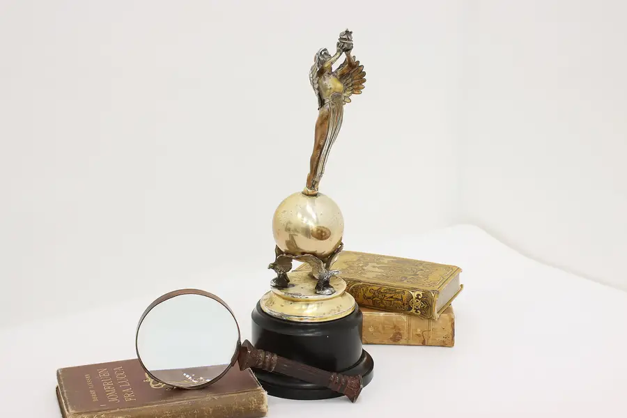 Photo of Winged Lady & Torch Vintage Silverplate Trophy International