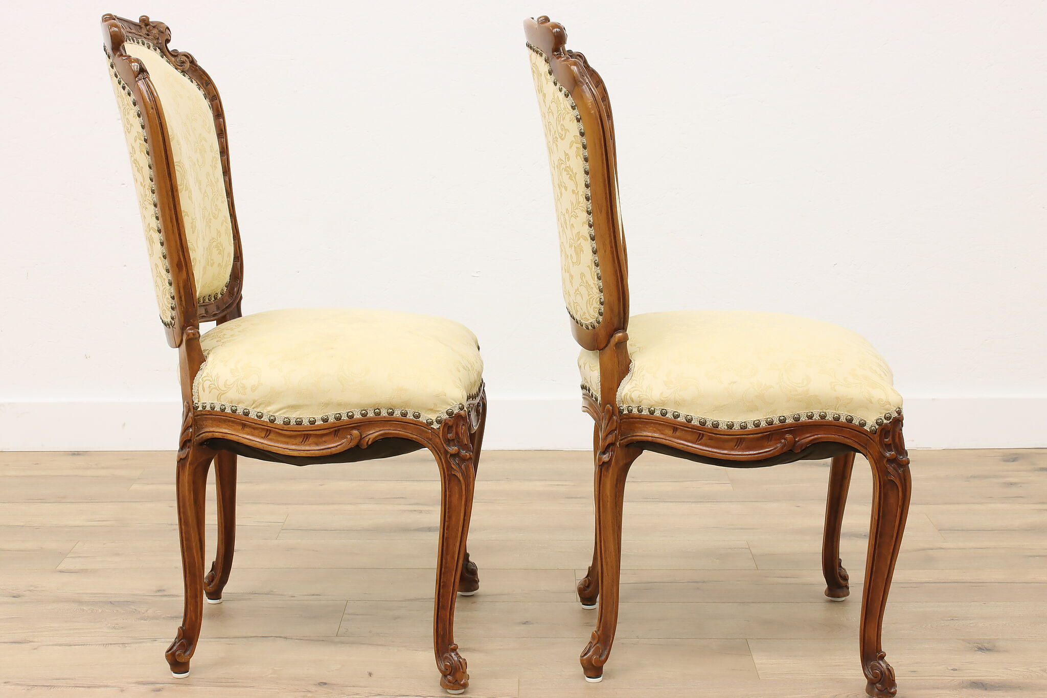 Lot - SET OF SIX LOUIS XVI STYLE CARVED WALNUT UPHOLSTERED DINING CHAIRS;