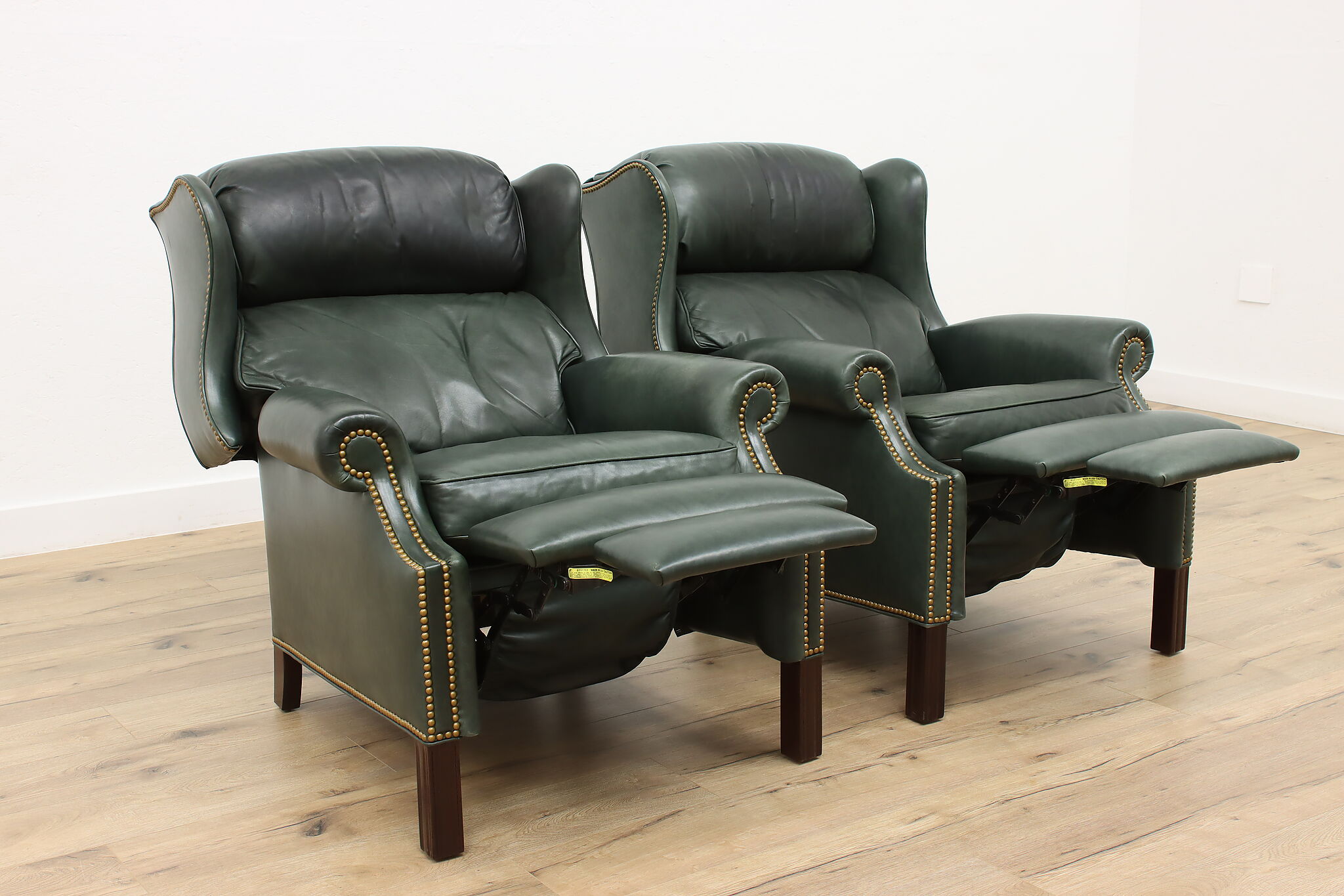 Pair of Vintage Leather Wing Recliner Chairs Hancock Moore