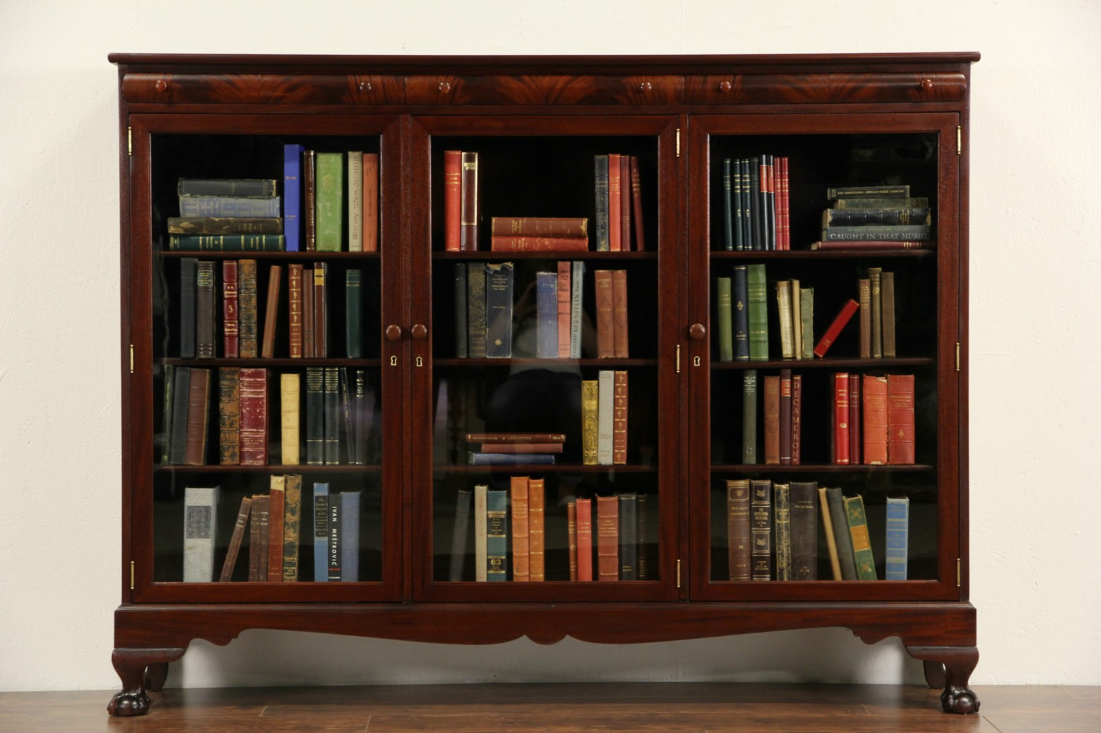 Mahogany 1900 Antique Triple Library Bookcase, Clawfeet, Wavy Glass Doors