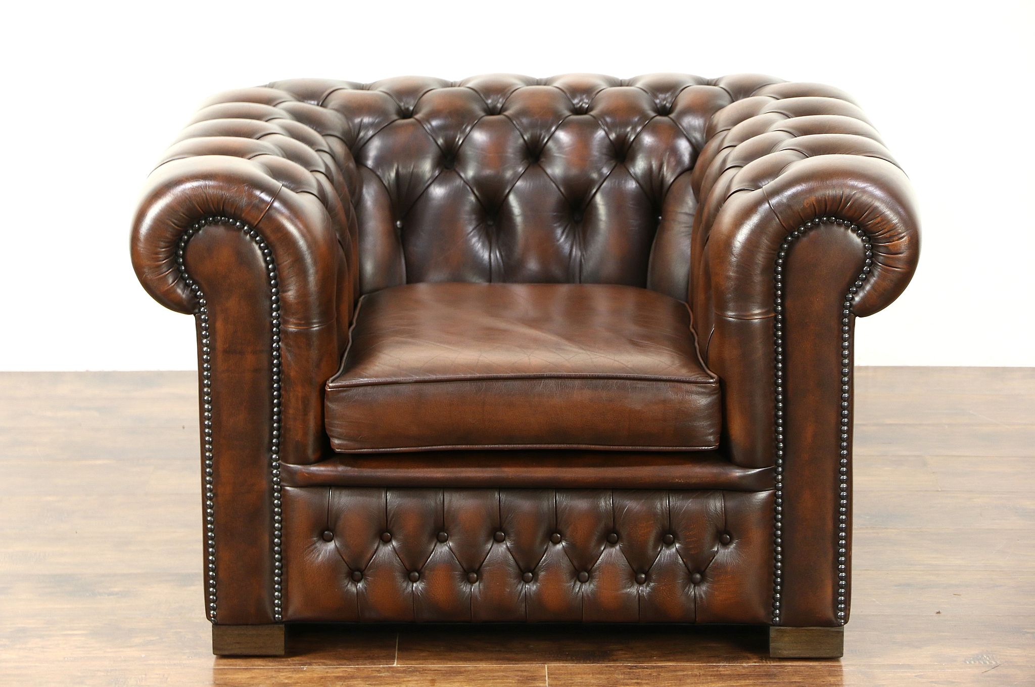 brown leather tufted sofa chair