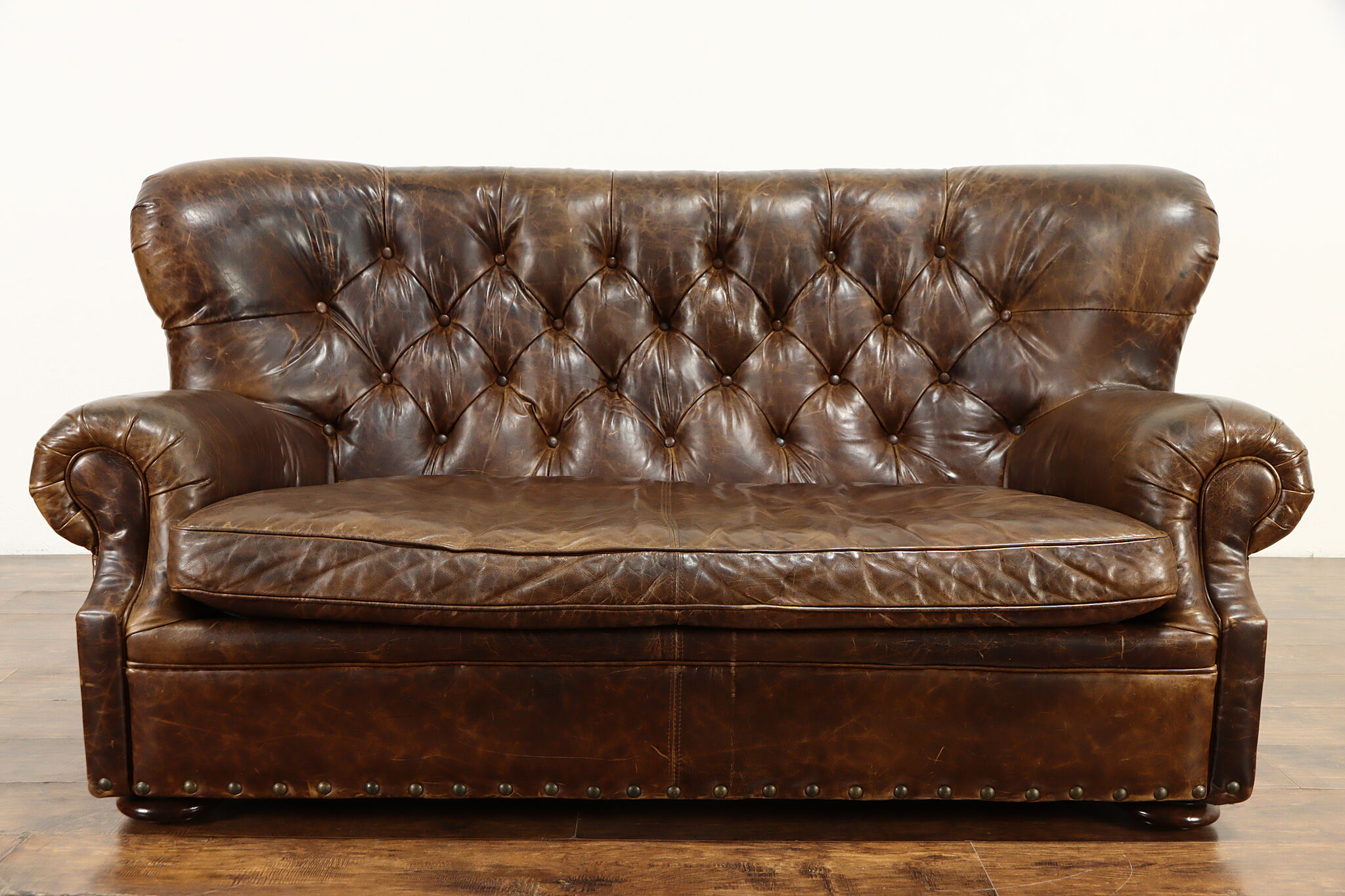 Tufted leather shop sofa restoration hardware
