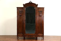 Italian Triple 1900 Antique Carved Walnut Armoire Wardrobe or Closet Mirror Door
