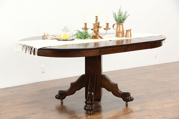 Oak 1900 Antique 42" Round Dining Table, 2 Leaves, Carved Lion Paw Feet photo