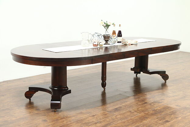 Empire 54" Round Antique Mahogany Dining Table, Extends 10' 6" photo